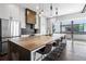 Modern kitchen featuring an extra large island with seating and stainless steel appliances at 1331 Iverson Ne St # A, Atlanta, GA 30307
