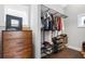 Walk-in closet with custom shelving and hardwood floors at 1331 Iverson Ne St # A, Atlanta, GA 30307