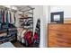 Spacious walk-in closet with custom shelving and hardwood floors at 1331 Iverson Ne St # A, Atlanta, GA 30307