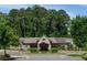 Charming clubhouse with manicured landscaping and traditional architectural details at 144 Still Pine Bnd, Smyrna, GA 30082