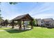 Community park with a gazebo, picnic tables, and playground surrounded by green space at 144 Still Pine Bnd, Smyrna, GA 30082