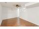 Finished basement featuring wood-look flooring and a ceiling fan at 160 Winter Park Ln, Powder Springs, GA 30127