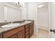 Bathroom features a double vanity, granite countertop, and tile flooring at 160 Winter Park Ln, Powder Springs, GA 30127