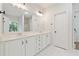 Bright bathroom with tile floors, double sink vanity, and ample storage at 160 Winter Park Ln, Powder Springs, GA 30127