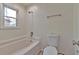 Bright bathroom with modern fixtures, toilet and tub at 5350 Rockbridge Rd, Stone Mountain, GA 30088