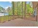 Spacious deck showcasing wood railings, ideal for outdoor entertaining and relaxation at 5350 Rockbridge Rd, Stone Mountain, GA 30088