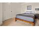 Inviting bedroom featuring a well-lit room, light grey walls, and comfortable carpet flooring at 6322 Scudders Dr, Lithonia, GA 30058