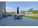 Backyard with a patio, a table with chairs, a playset and a fence at 5985 Hidden Ridge Ct, Cumming, GA 30028