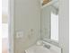 Bathroom with a vanity sink, a mirror, and some outdated fixtures at 3311 Basking Shade Ln, Decatur, GA 30034