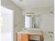 Bathroom with a vanity sink, a mirror, and a combination tub and shower at 3311 Basking Shade Ln, Decatur, GA 30034