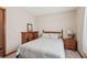 Bedroom featuring neutral walls, queen bed, dresser and nightstands at 4315 Hickory Point Dr, Canton, GA 30115