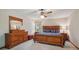 Neutral bedroom featuring a queen size bed, full dresser, and plenty of natural light at 4315 Hickory Point Dr, Canton, GA 30115
