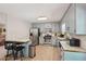 Spacious kitchen with stainless steel appliances, neutral cabinetry, and a breakfast bar at 4315 Hickory Point Dr, Canton, GA 30115