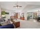 Large living room flows into the dining area, featuring a stone fireplace at 4315 Hickory Point Dr, Canton, GA 30115