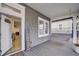 Inviting front porch featuring a cozy porch swing and stylish decor, leading into the home's entrance at 1463 Metropolitan Sw Pkwy, Atlanta, GA 30310