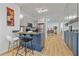 Well-designed kitchen with granite countertops, stainless steel appliances, and a breakfast bar; open concept living at 1463 Metropolitan Sw Pkwy, Atlanta, GA 30310