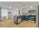 Modern kitchen with stainless steel appliances, granite countertops, and stylish cabinets; well-lit and functional at 1463 Metropolitan Sw Pkwy, Atlanta, GA 30310