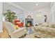 Cozy living room featuring comfortable seating and bright natural light, creating a welcoming atmosphere at 1463 Metropolitan Sw Pkwy, Atlanta, GA 30310