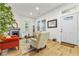 Bright living room with lots of natural light, fireplace, and neutral decor, perfect for relaxation at 1463 Metropolitan Sw Pkwy, Atlanta, GA 30310