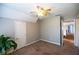 Bedroom featuring neutral walls, carpet, natural light, ceiling fan, and a closet at 2975 Oak Hampton Way, Duluth, GA 30096