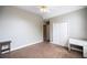 Neutral bedroom featuring closet, ceiling fan, and plush carpeting at 2975 Oak Hampton Way, Duluth, GA 30096