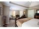 Spacious bedroom featuring trey ceiling, neutral colors, carpet, a ceiling fan, furniture and closet at 2975 Oak Hampton Way, Duluth, GA 30096