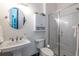 Bright bathroom with a modern sink, updated shower, and classic subway tile at 1014 Braeburn Ln, Decatur, GA 30030