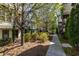 A townhome community showcases meticulously landscaped common areas, fostering a welcoming atmosphere at 1014 Braeburn Ln, Decatur, GA 30030