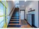 Stylish entryway featuring hardwood floors and staircase, creating a grand entrance at 1014 Braeburn Ln, Decatur, GA 30030