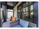 Cozy front porch features comfortable seating, perfect for relaxing and enjoying the outdoors at 1014 Braeburn Ln, Decatur, GA 30030