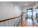 Hallway with wood floors leading to bedroom with wood and white trim at 1014 Braeburn Ln, Decatur, GA 30030