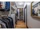 Walk-in closet with ample hanging space and shelving for shoes and accessories at 1014 Braeburn Ln, Decatur, GA 30030