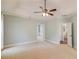 Large, versatile bonus room with neutral carpet, ample space, and multiple entryways at 12340 Preserve Ln, Alpharetta, GA 30005