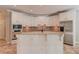 Eat-in kitchen is equipped with stainless appliances and custom cabinetry at 12340 Preserve Ln, Alpharetta, GA 30005