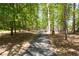 Take a relaxing stroll on this tree-lined paved trail surrounded by the beauty of nature at 12340 Preserve Ln, Alpharetta, GA 30005
