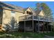 Spacious backyard featuring a large deck with a railing, perfect for outdoor entertaining at 1424 Belmont Rd, Villa Rica, GA 30180