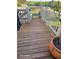 A wooden deck with white railings is ideal for relaxing or entertaining with peaceful outdoor views at 1424 Belmont Rd, Villa Rica, GA 30180
