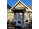Entrance view of a covered doorway, with additional space for seating at 1424 Belmont Rd, Villa Rica, GA 30180