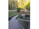 Charming front yard with professional landscaping, lush plantings, and inviting walkway at 1424 Belmont Rd, Villa Rica, GA 30180