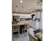 Spacious kitchen featuring white cabinets, stainless steel appliances, and a central island at 1424 Belmont Rd, Villa Rica, GA 30180
