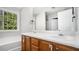 Bathroom featuring double sink vanity, modern fixtures, and natural light at 210 Arbor Creek Dr, Dallas, GA 30157