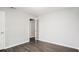 The bedroom showcases neutral paint and luxury vinyl flooring, enhancing comfort at 210 Arbor Creek Dr, Dallas, GA 30157
