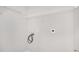 The laundry area has a washer and dryer hookup with wire shelving above at 210 Arbor Creek Dr, Dallas, GA 30157
