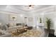 Inviting living area with a fireplace, ceiling fan, and wood-look floors at 210 Arbor Creek Dr, Dallas, GA 30157