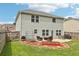 The home features a large backyard with patio furniture at 6904 Estepona St, Atlanta, GA 30349