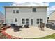 Enjoy outdoor living on the patio in this backyard, complete with a grilling area and comfortable seating at 6904 Estepona St, Atlanta, GA 30349
