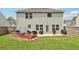 Spacious backyard offers a lovely patio area, ideal for outdoor gatherings and relaxation at 6904 Estepona St, Atlanta, GA 30349