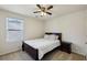 This bedroom is equipped with a cozy bed and a convenient nightstand at 6904 Estepona St, Atlanta, GA 30349