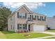Beautiful home showcasing brick and siding and a well-kept lawn at 6904 Estepona St, Atlanta, GA 30349