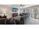 Cozy living room with comfortable seating and an elegant fireplace feature at 6904 Estepona St, Atlanta, GA 30349